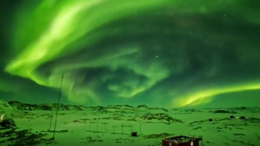 Aurora lights up the night sky over Zhongshan Station in Antarctica