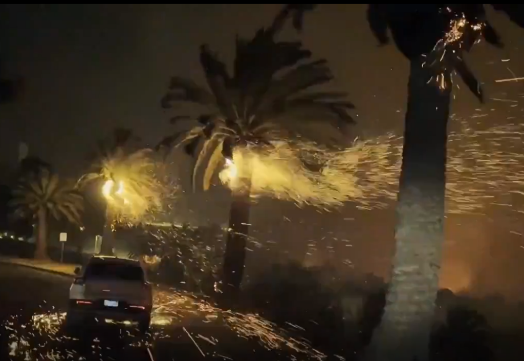 Flames and smoke from the Franklin Fire in Malibu, California, as homes and landscapes burn.